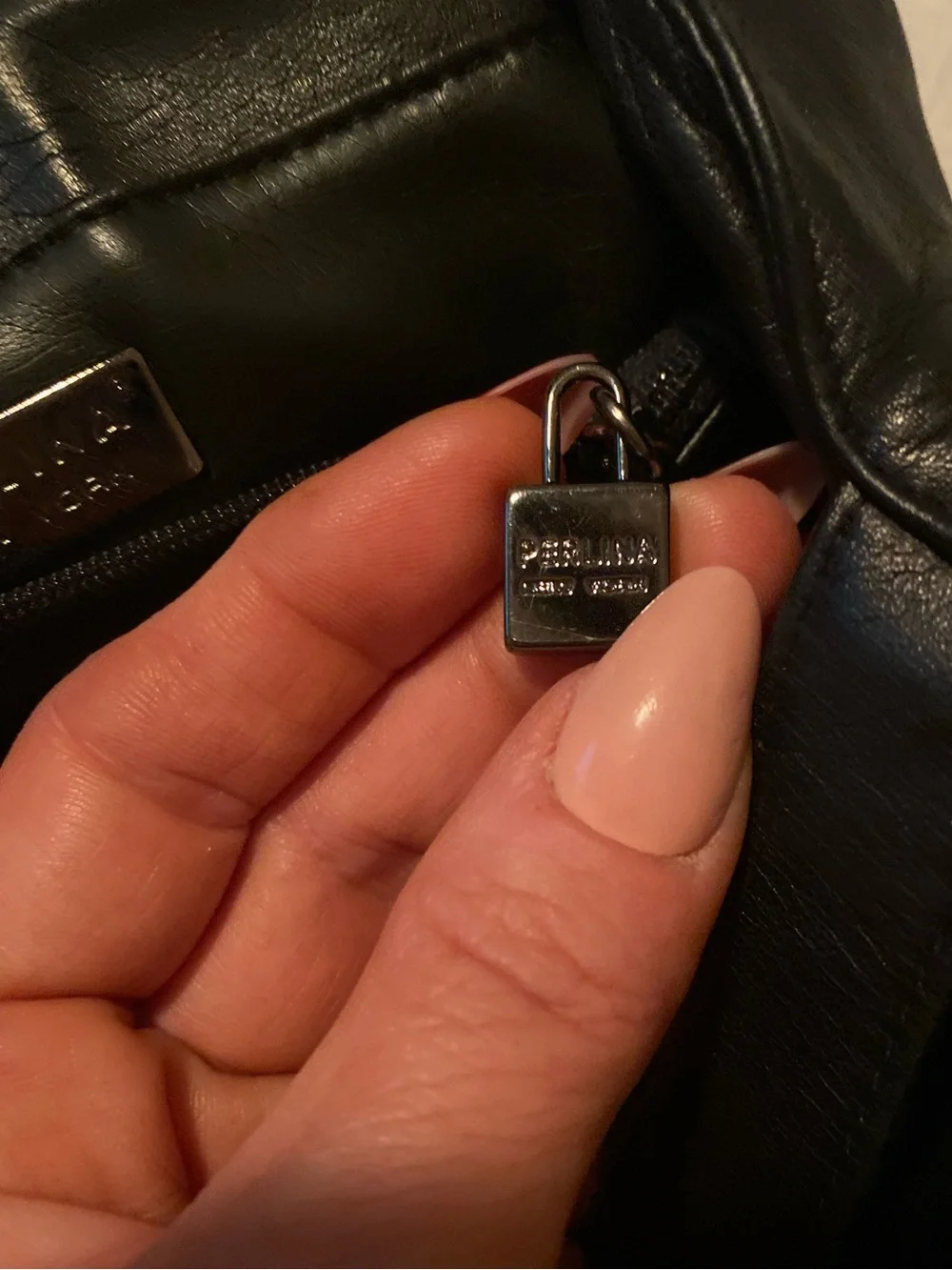 Perlina Black Leather Backpack with Silver Clasp